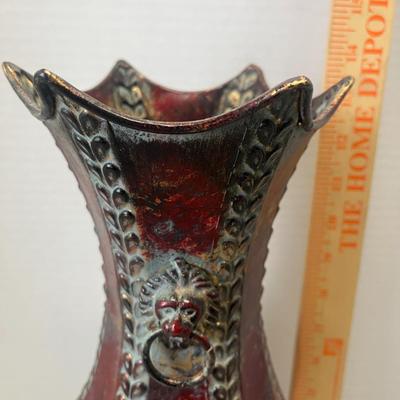 Sale Photo Thumbnail #789: This  metal vase is a beautiful decorative piece for any occasion.