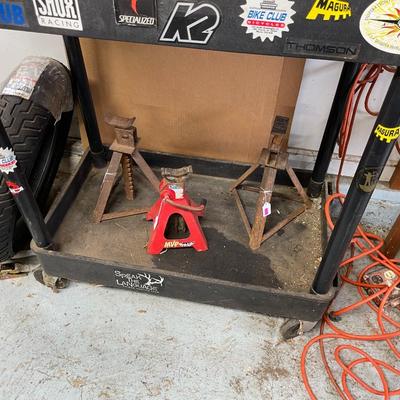 Three Automotive Jack Stands on Rolling Cart