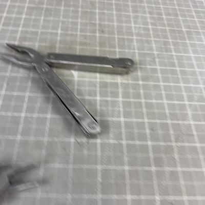 2 Multi Tools; Snap On and Another one