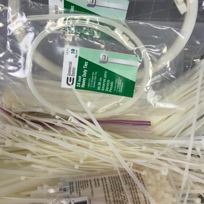 Tub full of Various Sizes of Cable / Zip Ties 