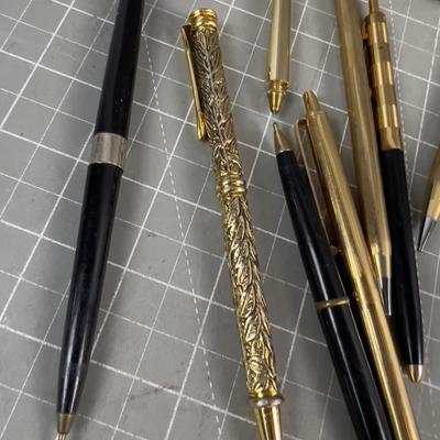 Gold and Black Ball Point Pens
