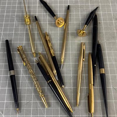 Gold and Black Ball Point Pens