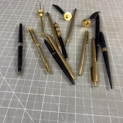 Gold and Black Ball Point Pens