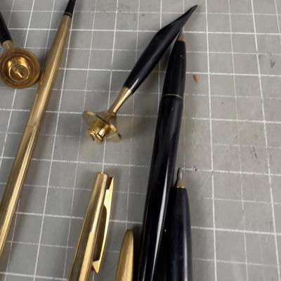 Gold and Black Ball Point Pens