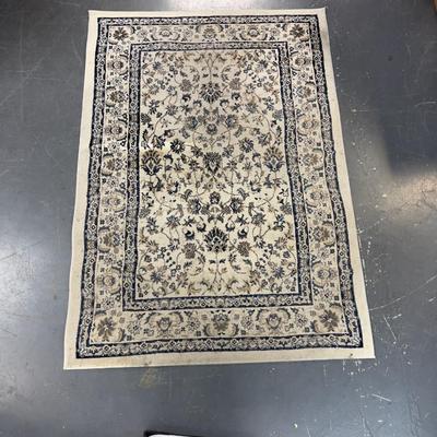 Rug: Machine Made  Color; Navy, Tan, Cream 