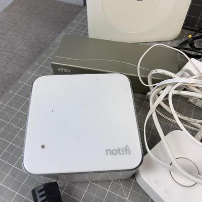 Modem with some Cords, Boosters, etc. 