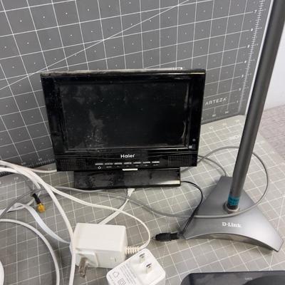 Modem with some Cords, Boosters, etc. 