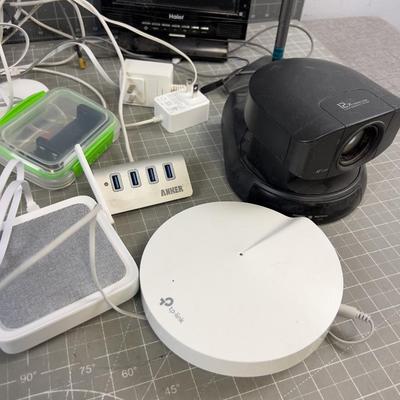 Modem with some Cords, Boosters, etc. 