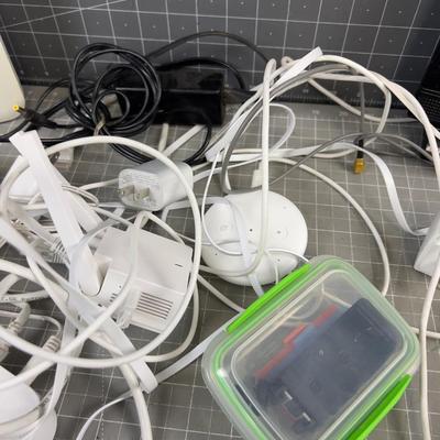 Modem with some Cords, Boosters, etc. 
