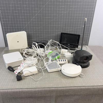 Modem with some Cords, Boosters, etc. 