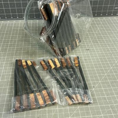 Tub full of brass brushes. (40) 