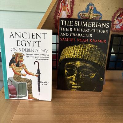 LOT 287: Handcrafted Egyptian A-Frame Style Doll House and Books