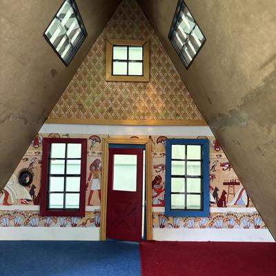 LOT 287: Handcrafted Egyptian A-Frame Style Doll House and Books