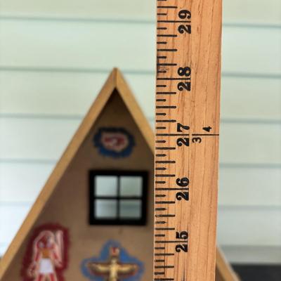 LOT 287: Handcrafted Egyptian A-Frame Style Doll House and Books
