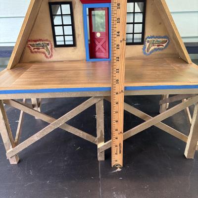LOT 287: Handcrafted Egyptian A-Frame Style Doll House and Books