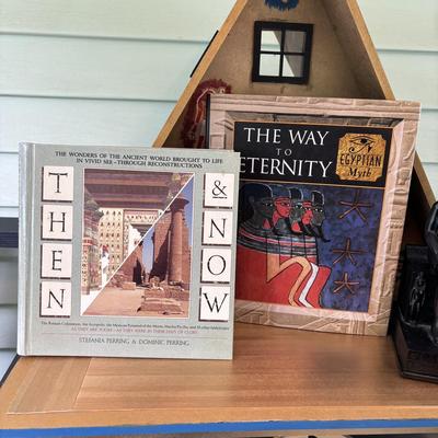 LOT 287: Handcrafted Egyptian A-Frame Style Doll House and Books
