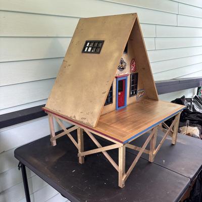 LOT 287: Handcrafted Egyptian A-Frame Style Doll House and Books