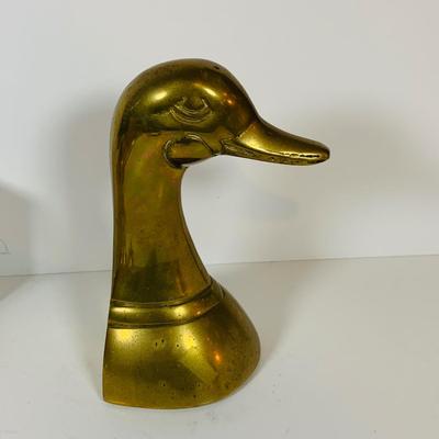 LOT 299: Clocks and Quacks - Brass Duck Book End, Bulova Quartz Mantle Clock, Florin Travel Clock, Swiza Swiss Coin Shaped Alarm Clock...