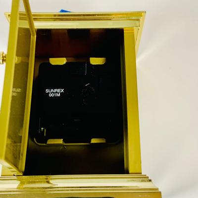 LOT 299: Clocks and Quacks - Brass Duck Book End, Bulova Quartz Mantle Clock, Florin Travel Clock, Swiza Swiss Coin Shaped Alarm Clock...