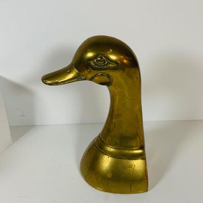 LOT 299: Clocks and Quacks - Brass Duck Book End, Bulova Quartz Mantle Clock, Florin Travel Clock, Swiza Swiss Coin Shaped Alarm Clock...