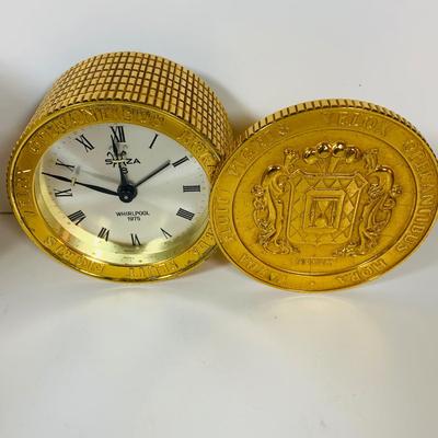 LOT 299: Clocks and Quacks - Brass Duck Book End, Bulova Quartz Mantle Clock, Florin Travel Clock, Swiza Swiss Coin Shaped Alarm Clock...
