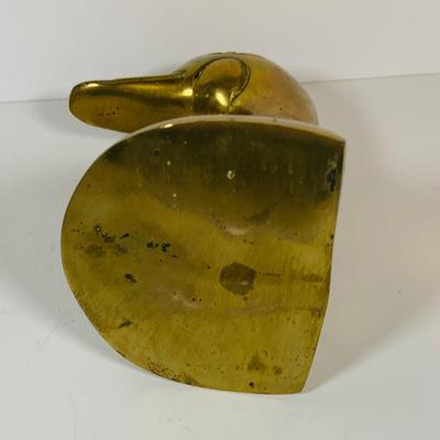 LOT 299: Clocks and Quacks - Brass Duck Book End, Bulova Quartz Mantle Clock, Florin Travel Clock, Swiza Swiss Coin Shaped Alarm Clock...