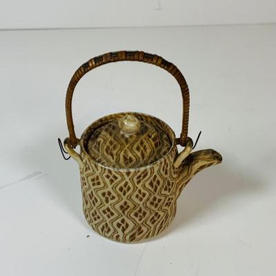 LOT 302: Japanese Collection Including Banks, Dolls, Furry Panda and More
