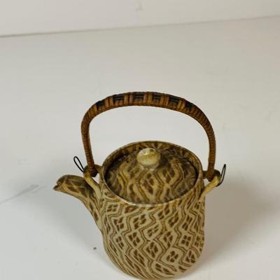 LOT 302: Japanese Collection Including Banks, Dolls, Furry Panda and More