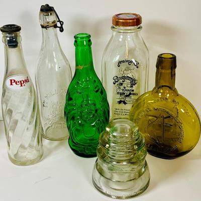LOT 303: Assortment of Bottles Including Vintag Pepsi, Clevenger Bros and More