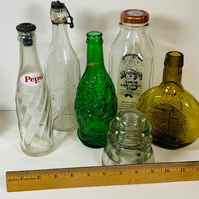 LOT 303: Assortment of Bottles Including Vintag Pepsi, Clevenger Bros and More
