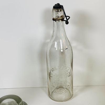 LOT 303: Assortment of Bottles Including Vintag Pepsi, Clevenger Bros and More