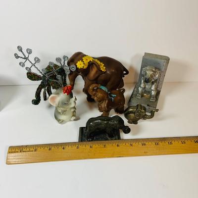 LOT 305: Collection of Elephant Figurines and More