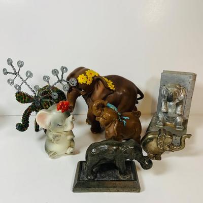 LOT 305: Collection of Elephant Figurines and More