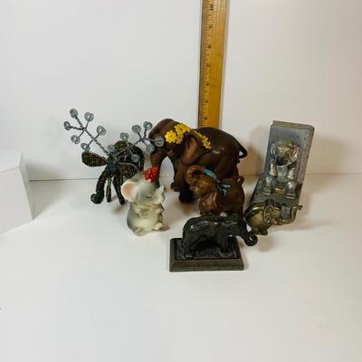 LOT 305: Collection of Elephant Figurines and More