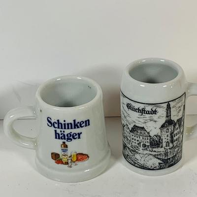 LOT 306: German Mug Metal Decanter, Shot Glasses and More