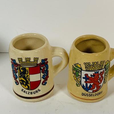 LOT 306: German Mug Metal Decanter, Shot Glasses and More