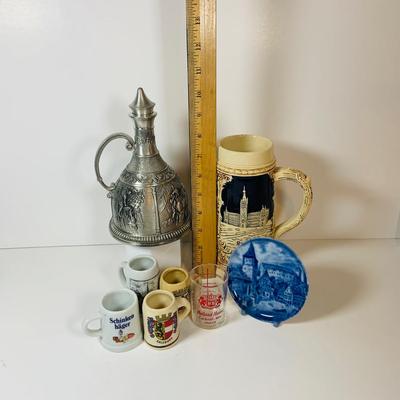 LOT 306: German Mug Metal Decanter, Shot Glasses and More