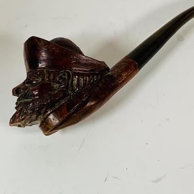 LOT 307: Pipes, Pipe Holder, Tobacco Jar, Cigarette Case, Crystal Bottle Stops Formica Tray, Brass Eagle Cane Handle and More