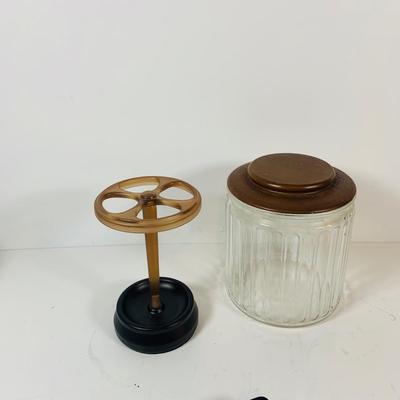 LOT 307: Pipes, Pipe Holder, Tobacco Jar, Cigarette Case, Crystal Bottle Stops Formica Tray, Brass Eagle Cane Handle and More
