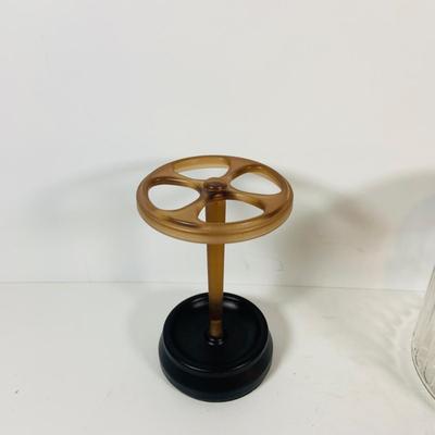 LOT 307: Pipes, Pipe Holder, Tobacco Jar, Cigarette Case, Crystal Bottle Stops Formica Tray, Brass Eagle Cane Handle and More