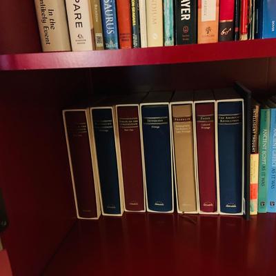 LOT 330: Red Wooden Book Case with Drawer and Glass Front Doors Books, and Book Ends