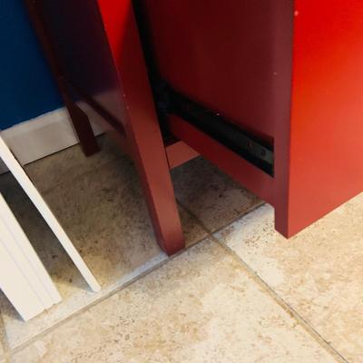 LOT 330: Red Wooden Book Case with Drawer and Glass Front Doors Books, and Book Ends