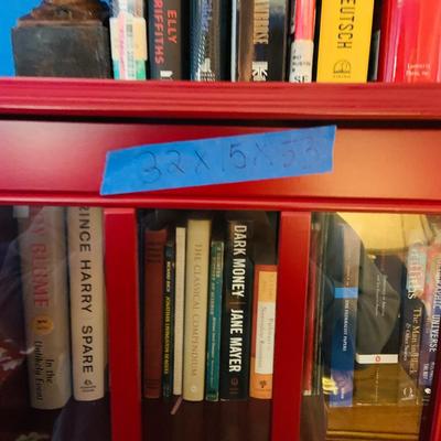 LOT 330: Red Wooden Book Case with Drawer and Glass Front Doors Books, and Book Ends