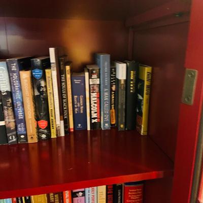 LOT 330: Red Wooden Book Case with Drawer and Glass Front Doors Books, and Book Ends