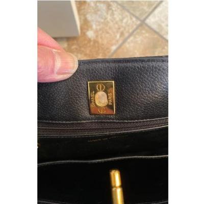 Sale Photo Thumbnail #4: 2.5”x10”x2.75” perfect size for daily use.  Very good vintage condition.  Some creases and minor scuffs very normal.  No rips or tears inside out.  Authenticity sticker inside reads 4786665.  Emblem and chain are 24 K plated very heavy and shining. 