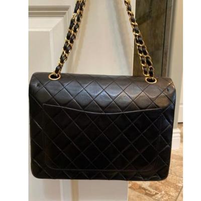 Sale Photo Thumbnail #37: Authentic Chanel double flaps bag in very good condition.  No rips or tears inside out.  Gold hardware in bright shining color.  Some minor wears and creases very good for its age.  Corners are fine.  Authenticity card included, the card has some damages 
