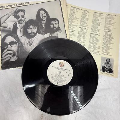 Sale Photo Thumbnail #506: Vintage vinyl album in fair condition with some light scratches.