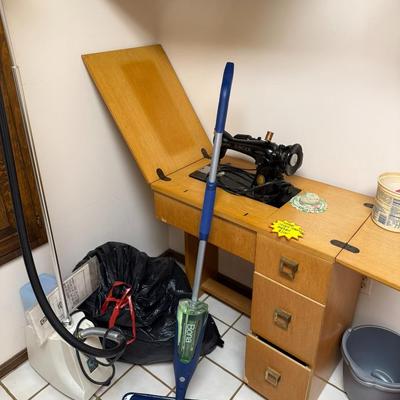 Laundry Room Supplies, including Singer Sewing Machine