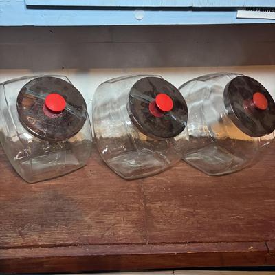 LOT 277-429: Set of Large Clear Glass Tilted Candy/Cookie Jar with Metal Lids & Red Knobs, Southern Living, Betty Crocker Cookbooks...