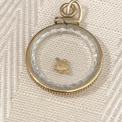 Gold Flake In Pendant